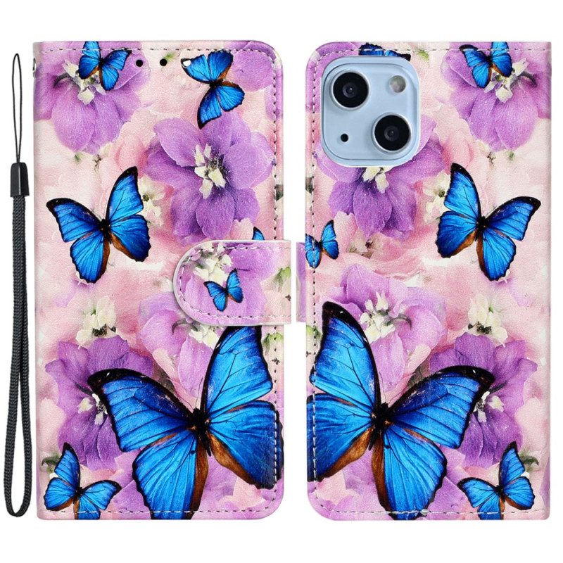 Custodia in pelle iPhone 15 Plus Piccole Farfalle Blu Con Cinturino