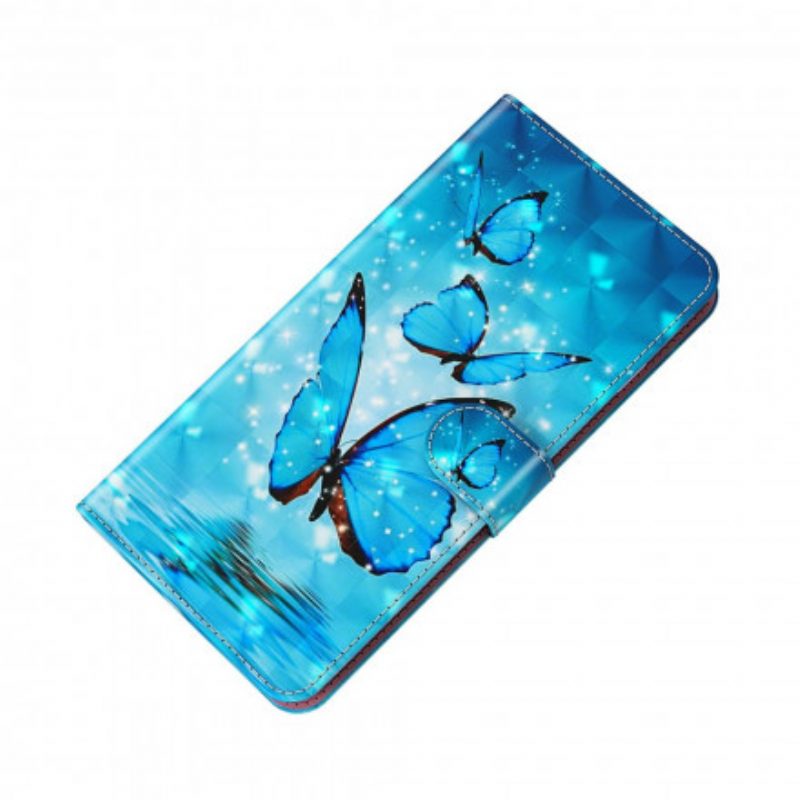 Custodia in pelle Xiaomi Redmi Note 9 Pro 5G Punto Luminoso Farfalle Blu Volanti