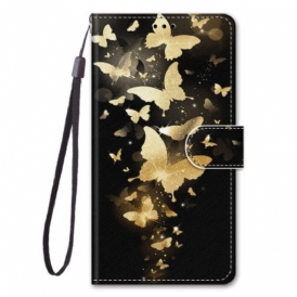 Custodia in pelle Xiaomi Redmi 10A Farfalle Dorate Con Cinturino