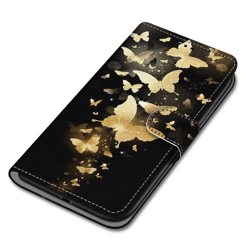 Custodia in pelle Xiaomi Redmi 10A Farfalle Dorate Con Cinturino