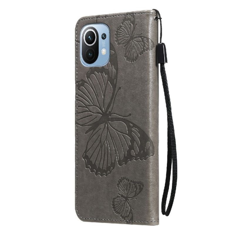 Folio Cover Xiaomi Mi 11 Lite 4G / 5G / 5G NE Farfalle Con Cinturino Gigante