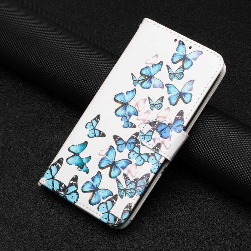 Custodia in pelle Moto G73 5G Farfalle Blu Nel Volo Della Cinghia