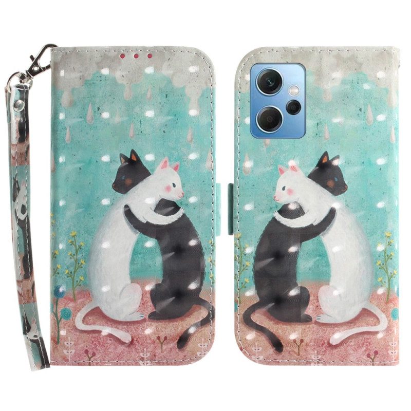 Custodia in pelle Xiaomi Redmi Note 12 4G Gatto Bianco Gatto Nero Con Cinturino