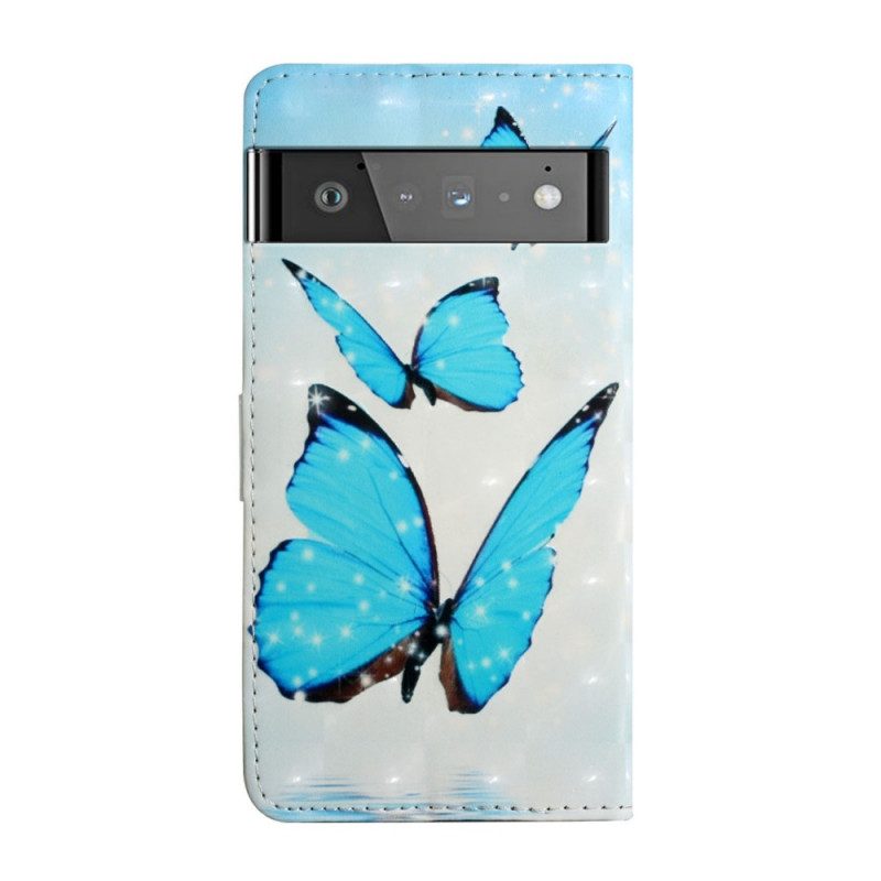 Custodia in pelle Google Pixel 6 Farfalle Blu Volanti