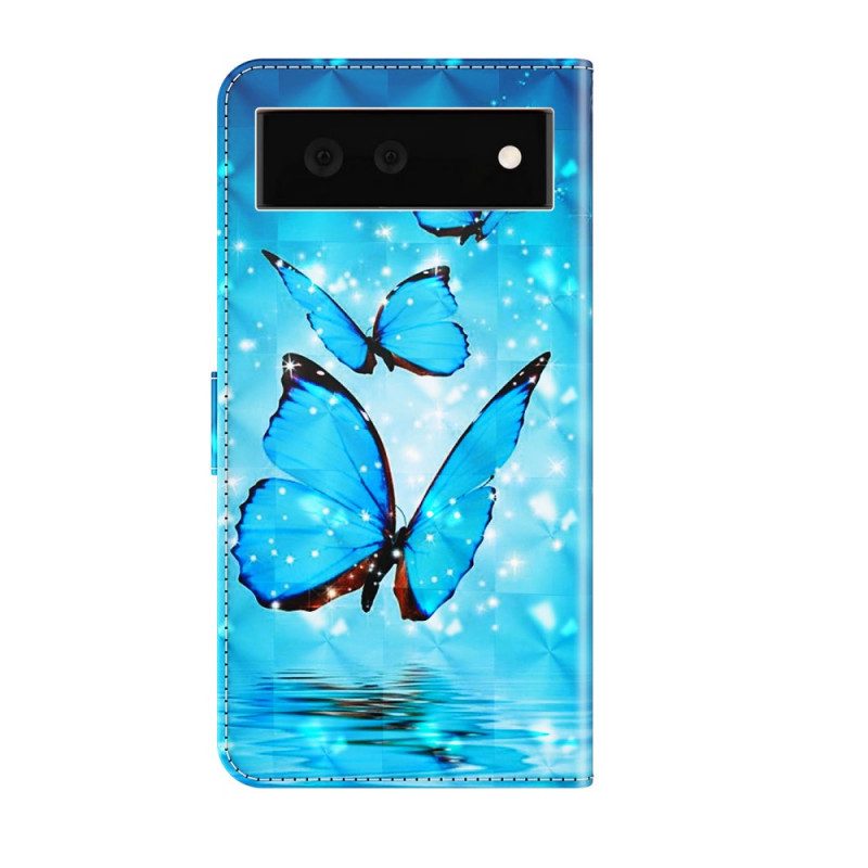 Custodia in pelle Google Pixel 6 Farfalle Blu Volanti
