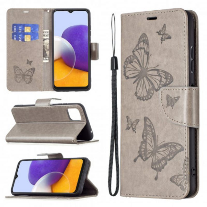 Custodia in pelle Samsung Galaxy A22 5G Farfalle In Volo Con Cordino