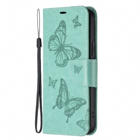 Custodia in pelle Xiaomi 13 Farfalle Stampate Strappy