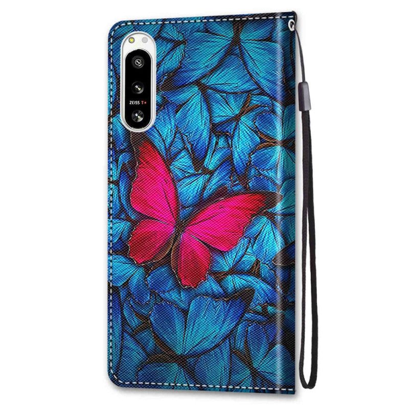 Custodia in pelle Sony Xperia 5 IV Farfalla Rossa Sfondo Blu