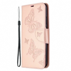 Custodia in pelle Huawei P40 Lite Farfalle Stampate Strappy
