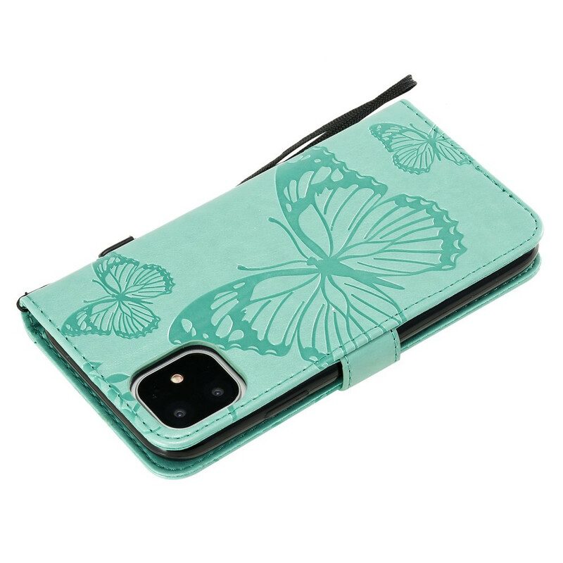 Custodia in pelle iPhone 11 Farfalle Con Cinturino Gigante