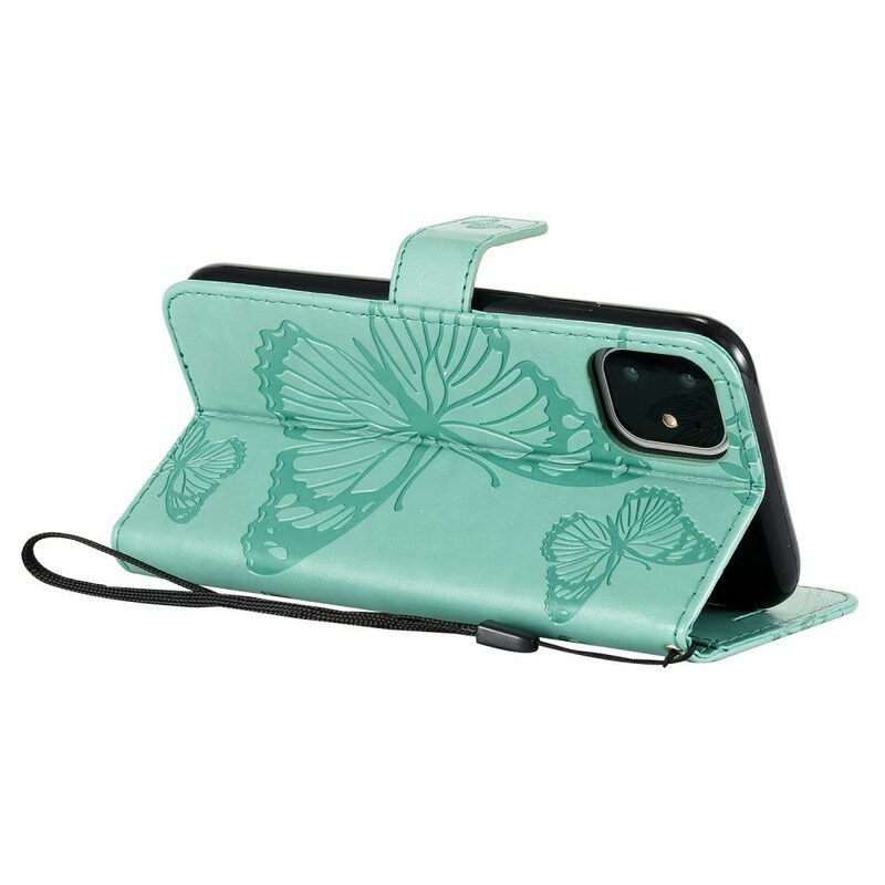 Custodia in pelle iPhone 11 Farfalle Con Cinturino Gigante