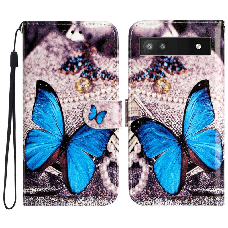 Custodia in pelle Google Pixel 7A Farfalla Blu Con Cinturino