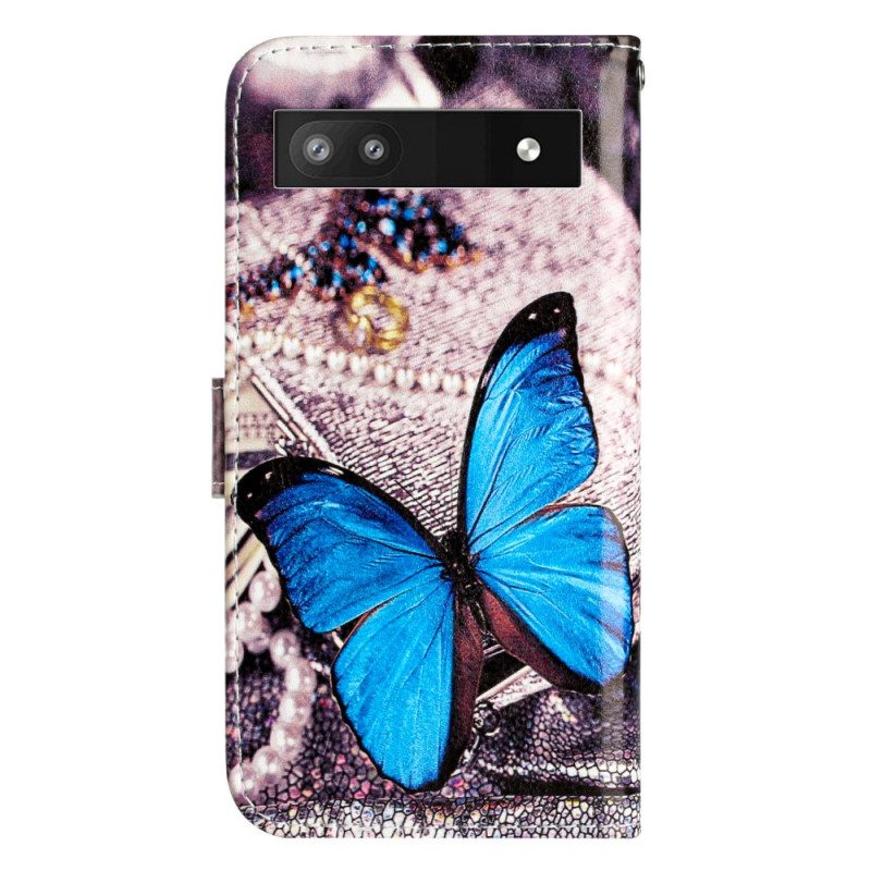 Custodia in pelle Google Pixel 7A Farfalla Blu Con Cinturino